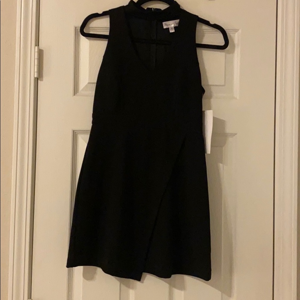 Black halter dress. New with tags.